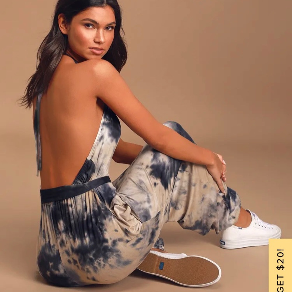 It’s chill navy blue multi tie-dye halter jumpsuit